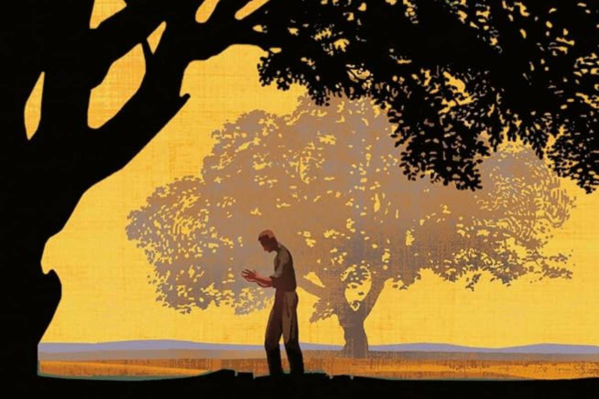A capa americana de A Leste do Eden, mostrando um homem distante debaixo de uma árvore, com um céu amarelo