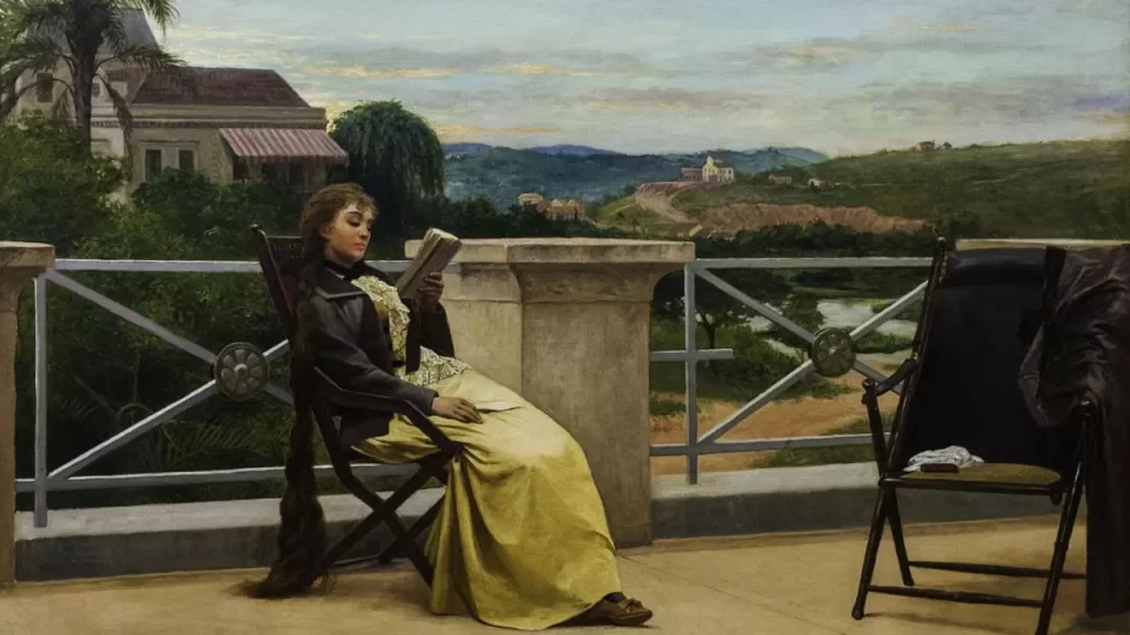 Pintura "A Leitura", de Almeida Júnior, retratando uma jovem mulher sentada na varanda lendo um livro com uma bela paisagem ao fundo